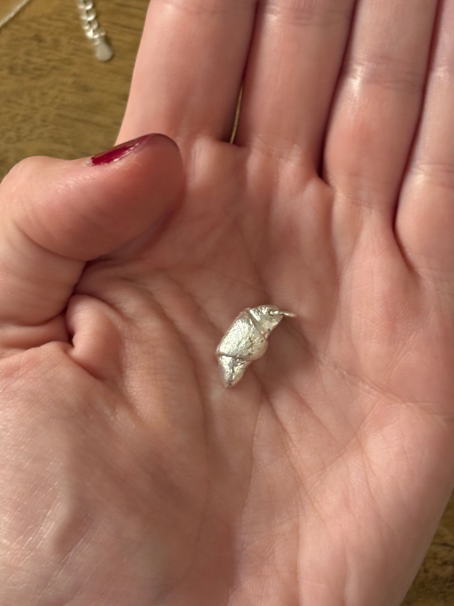 Handcrafted croissant pendant