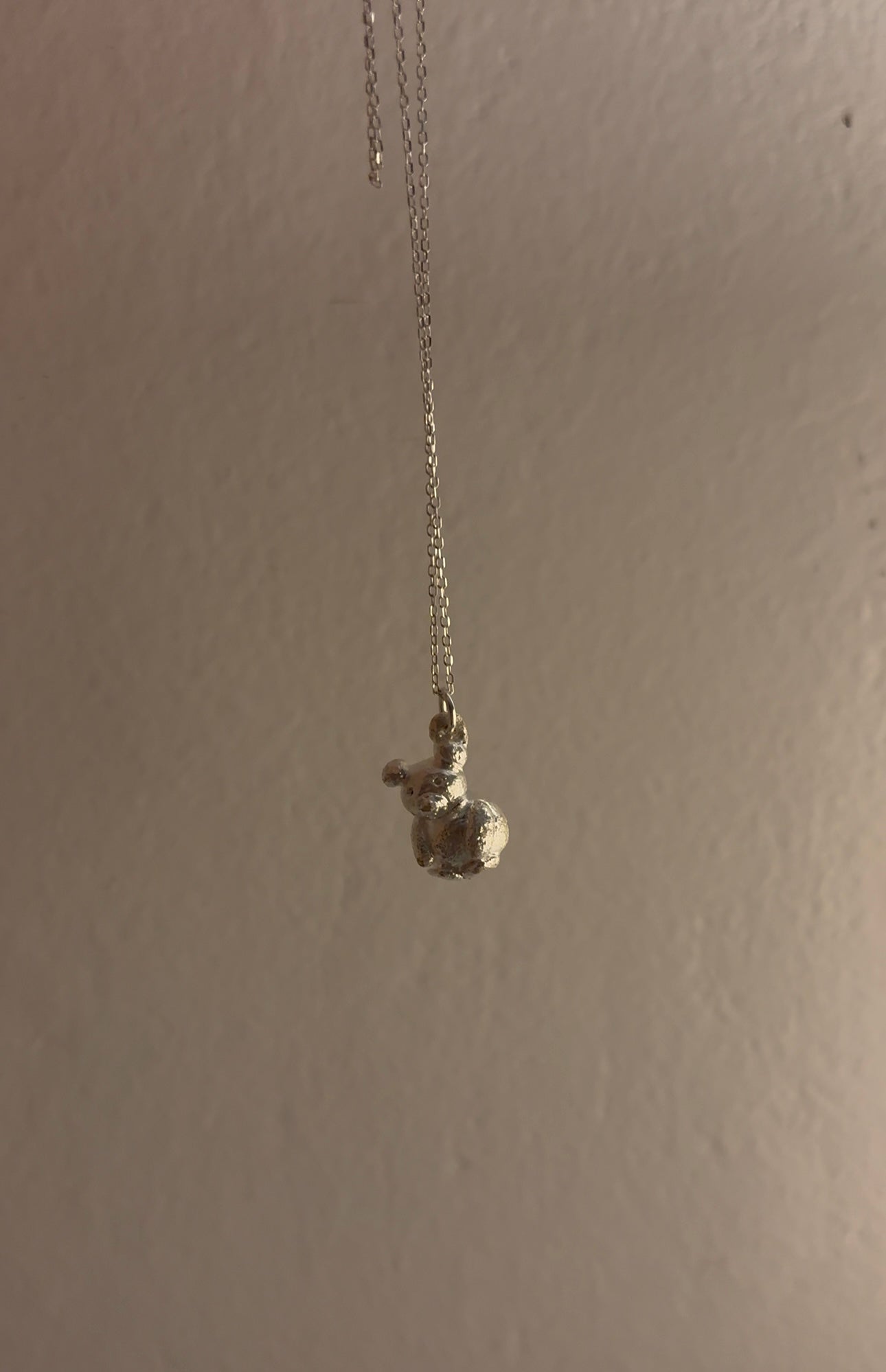 Handcrafted teddy bear pendant