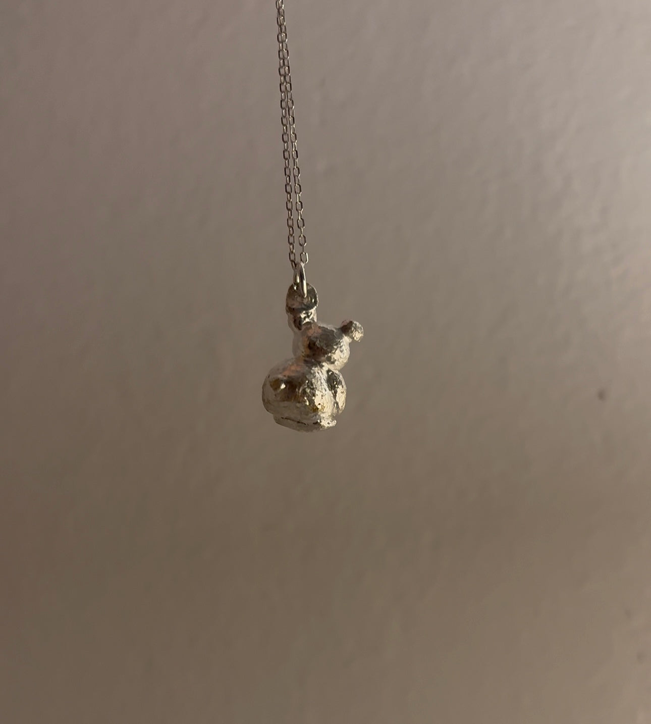 Handcrafted teddy bear pendant