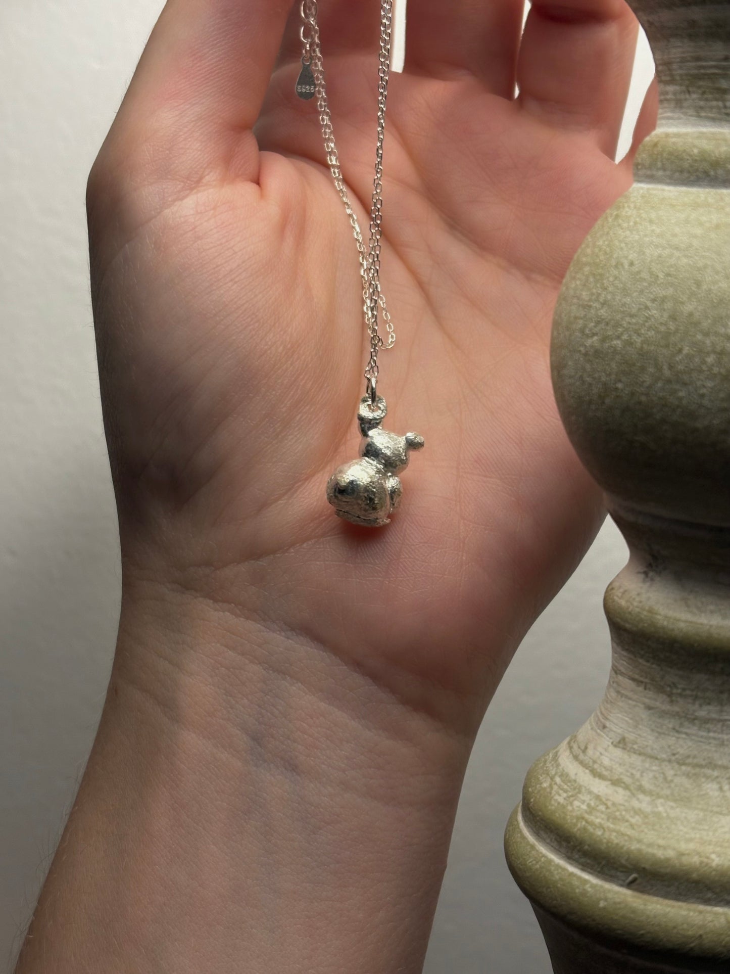 Handcrafted teddy bear pendant